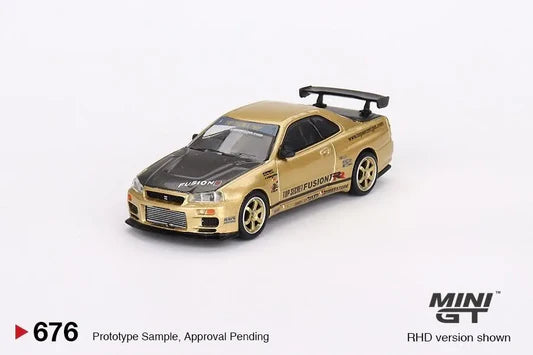 MINI GT 1:64 Nissan Skyline GT-R R34 Top Secret – Gold Chrome (TAS 2024)