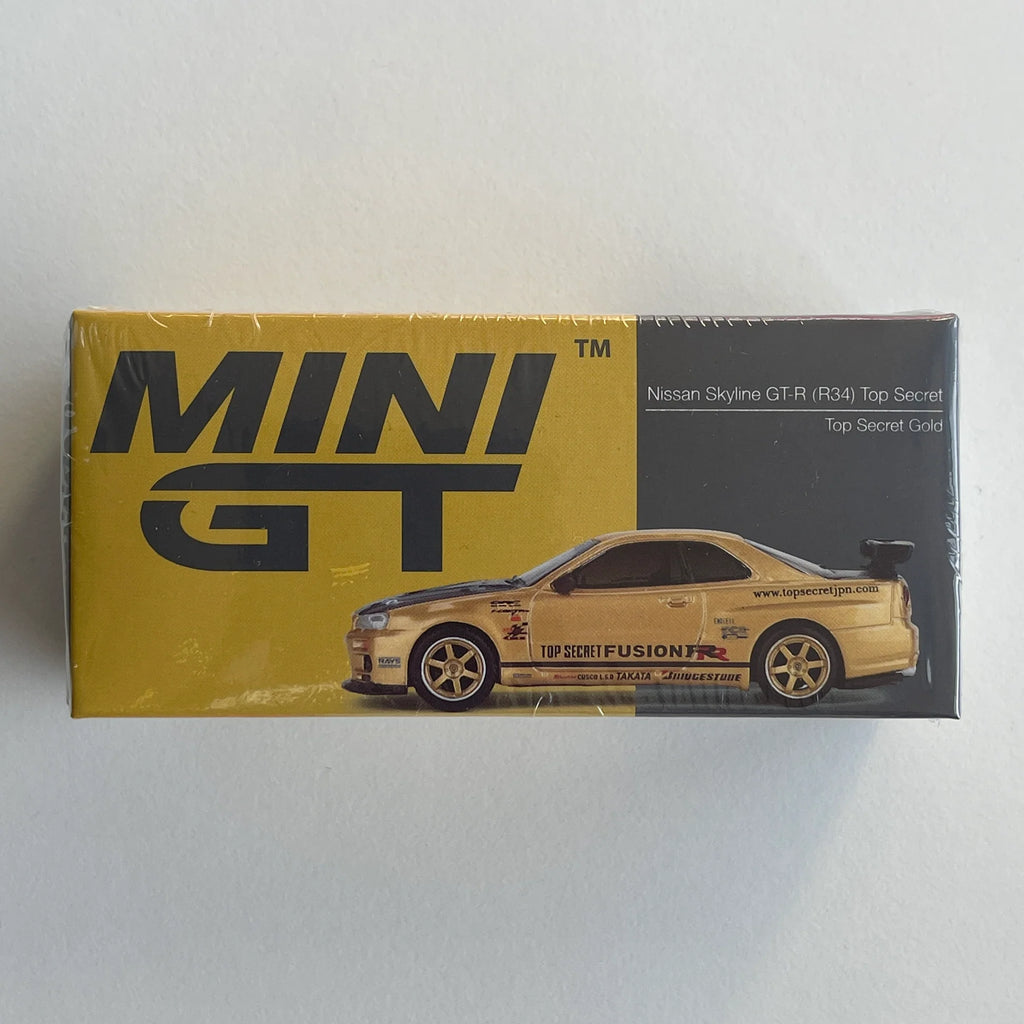 MINI GT 1:64 Nissan Skyline GT-R R34 – Top Secret Gold