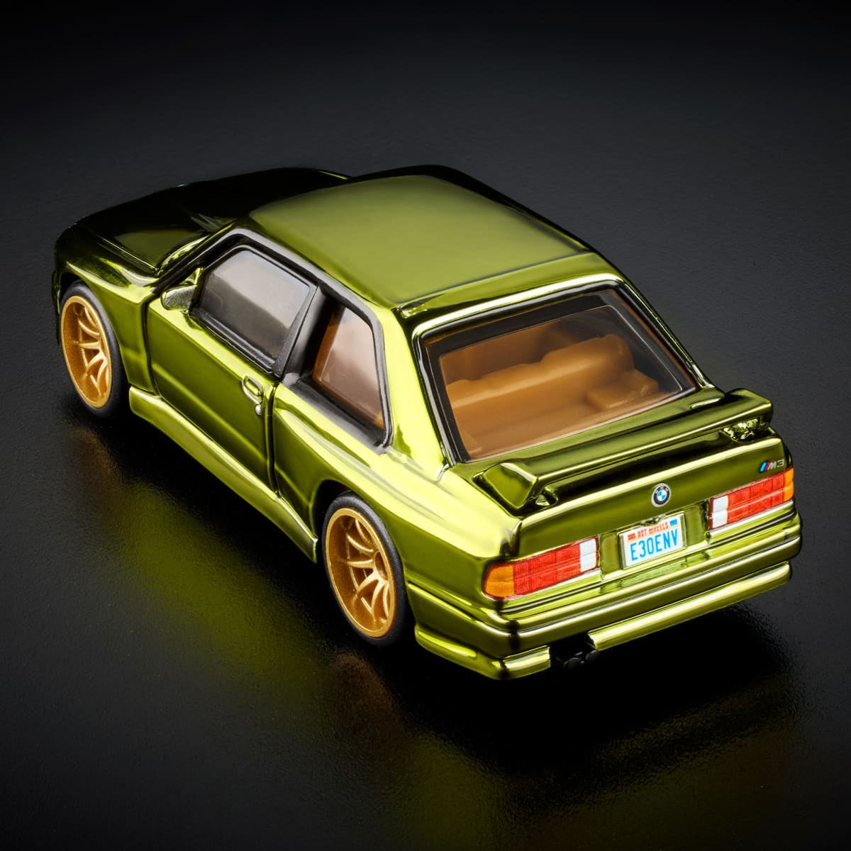 Hot Wheels RLC 1991 BMW M3 Spectraflame Olive rear three-quarter view