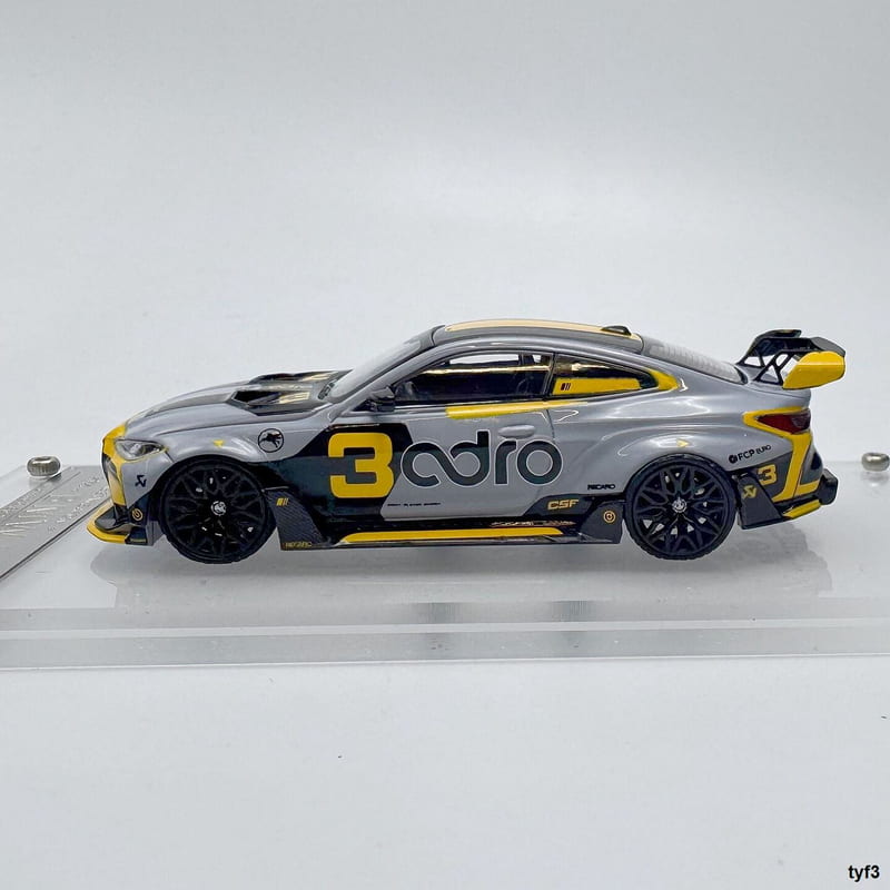 BMW M4 G82 grey yellow number 3 full side view
