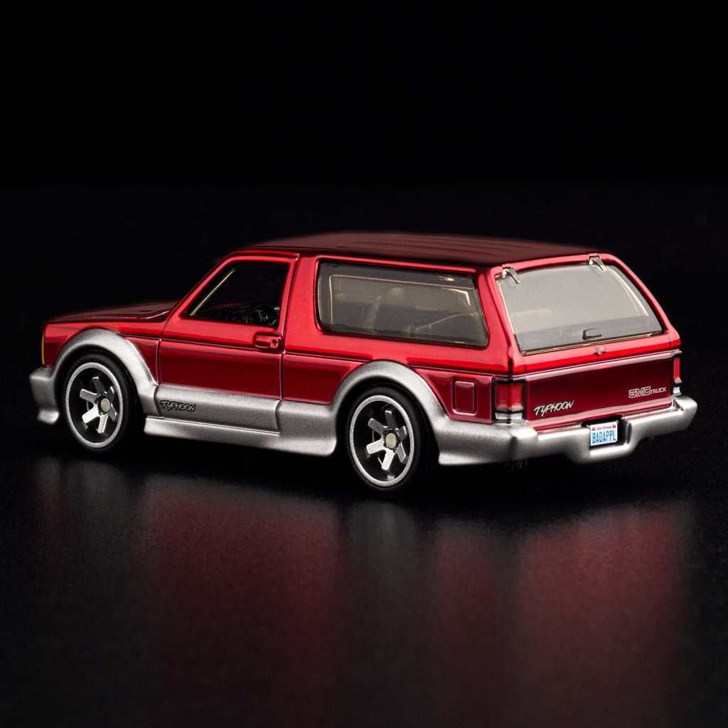 Hot Wheels RLC 1992 GMC Typhoon Spectraflame red JCP13 — Rear three-quarter view