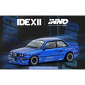 INNO64 BMW E30 Pandem Blue IDE 2025 – Front three-quarter view