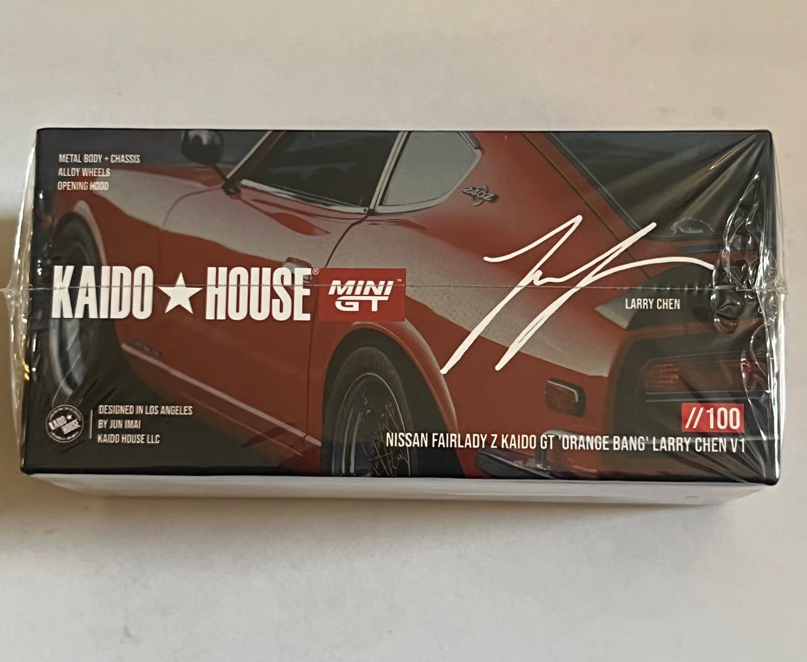 Kaido House x MINI GT 1:64 Datsun Fairlady Z Larry Chen V1 Orange Bang