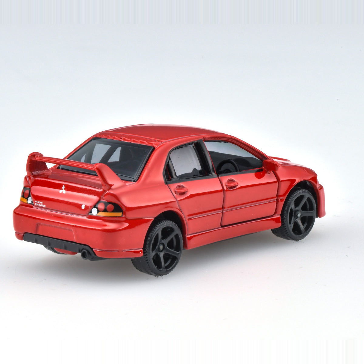 Majorette Mitsubishi Lancer Evolution IX red rear three-quarter view
