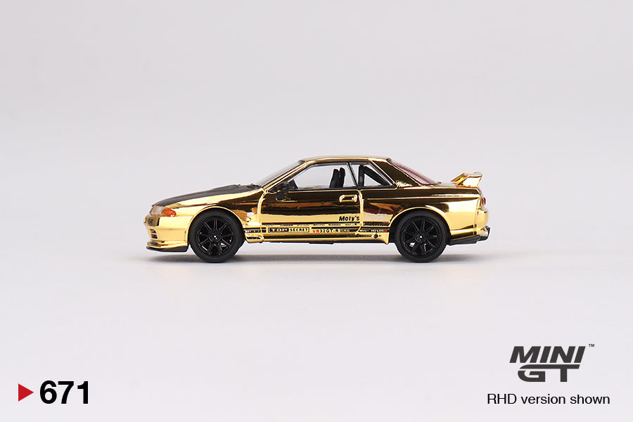 MINI GT 671 Top Secret VR32 Gold Chrome — side view