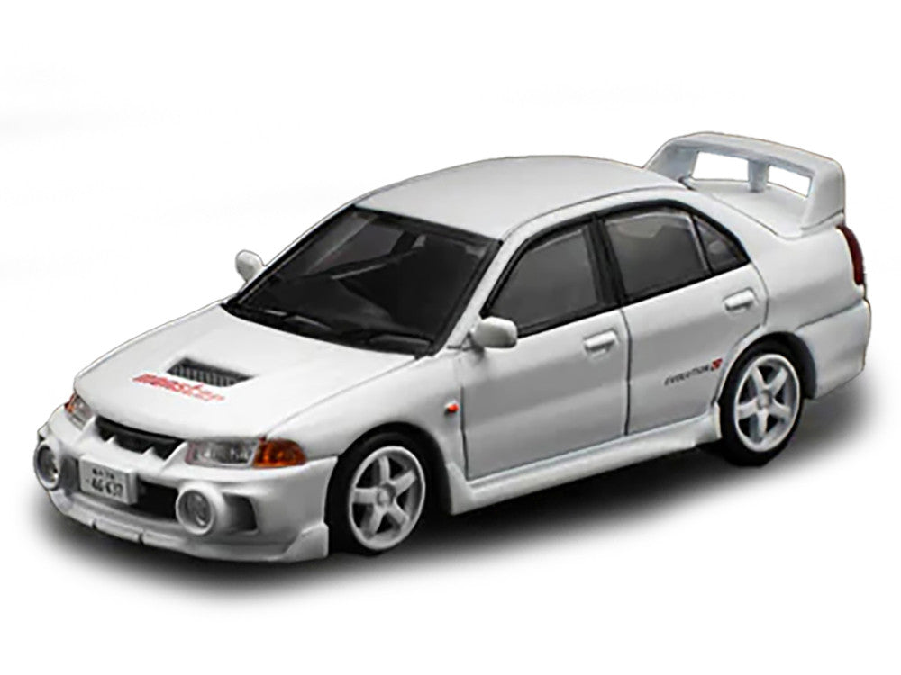 Mitsubishi Lancer Evolution IV White Monster IDE 2024 front view