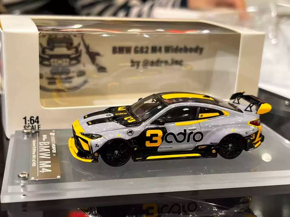 Street Warrior BMW M4 G82 grey and yellow number 3 with original APA XPO box and display base